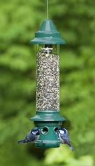 Blue tits on a Giant Squirrel Buster Seed Feeder
