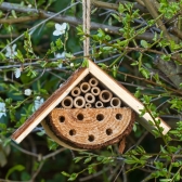 Insect Loft attracting pollinators in an orchard